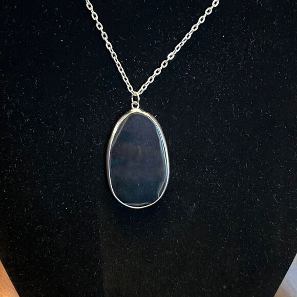Handcrafted black glass pendant on 18 inch silver tone chain